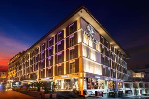 a large building with a clock on top of it at DoubleTree By Hilton Istanbul - Old Town in Istanbul
