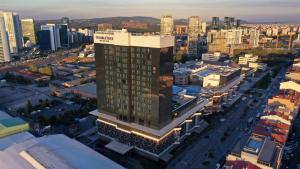 an overhead view of a city with a tall building at Doubletree by Hilton Istanbul Umraniye in Istanbul