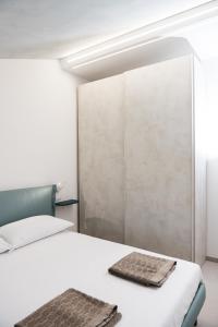 Postel nebo postele na pokoji v ubytování Borgo Fe'