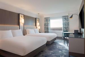 Postel nebo postele na pokoji v ubytování Hilton Glasgow
