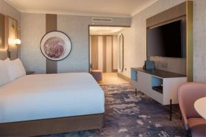 TV a/nebo společenská místnost v ubytování Hilton Glasgow