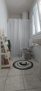 Koupelna v ubytování Comfy apartment near the port and the center of Volos