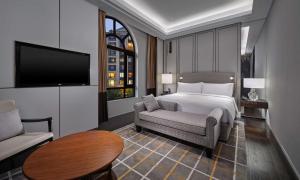 Postel nebo postele na pokoji v ubytování Hilton Beijing Daxing