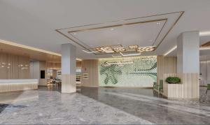 a lobby with a large wall with a painting on it at Hilton Garden Inn Beijing Daxing International Airport in Beijing