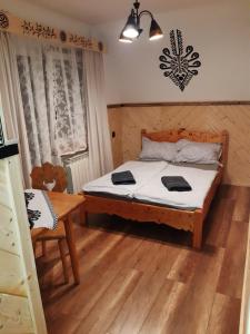 Postel nebo postele na pokoji v ubytování Na wierchu