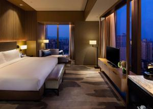 TV a/nebo společenská místnost v ubytování DoubleTree by Hilton Chongqing - Nan'an