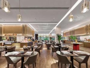 A restaurant or other place to eat at Hilton Jiaxing