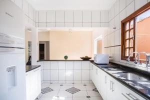 A cozinha ou cozinha compacta de PARAISO DO ALEXANDRE para 15 hóspedes