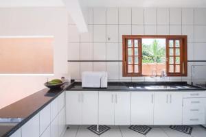 A cozinha ou cozinha compacta de PARAISO DO ALEXANDRE para 15 hóspedes