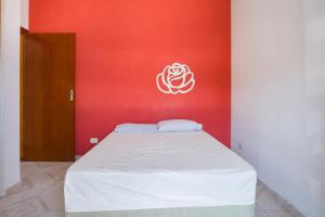 Cama ou camas em um quarto em PARAISO DO ALEXANDRE para 15 hóspedes