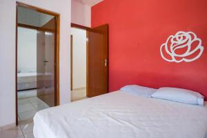 Cama ou camas em um quarto em PARAISO DO ALEXANDRE para 15 hóspedes