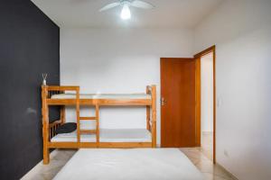 Cama ou camas em um quarto em PARAISO DO ALEXANDRE para 15 hóspedes