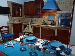 Kuchyň nebo kuchyňský kout v ubytování Suite Blue Marine