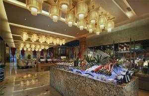 a store with a display of fruits and vegetables at Hilton Tianjin Eco-City in Binhai