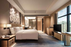 TV a/nebo společenská místnost v ubytování Doubletree By Hilton Yangzhou