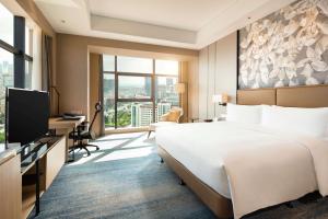 TV a/nebo společenská místnost v ubytování Doubletree By Hilton Yangzhou