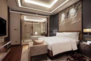 Postel nebo postele na pokoji v ubytování Doubletree By Hilton Yangzhou
