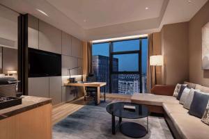 TV a/nebo společenská místnost v ubytování Doubletree By Hilton Yangzhou