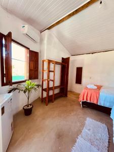 Ein Bett oder Betten in einem Zimmer der Unterkunft Pousada Clara