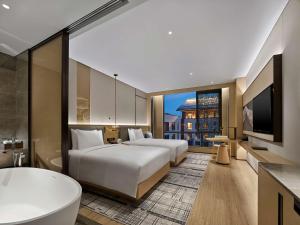 TV a/nebo společenská místnost v ubytování Doubletree By Hilton Beijing Badaling