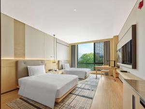 TV a/nebo společenská místnost v ubytování Doubletree By Hilton Beijing Badaling