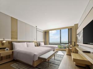 TV a/nebo společenská místnost v ubytování Doubletree By Hilton Beijing Badaling