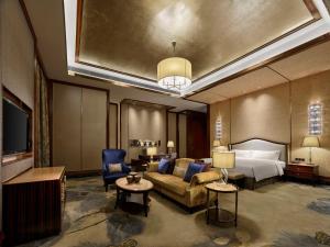 Postel nebo postele na pokoji v ubytování Hilton Zhongshan Downtown