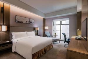 Posteľ alebo postele v izbe v ubytovaní DoubleTree by Hilton Hotel Shiyan