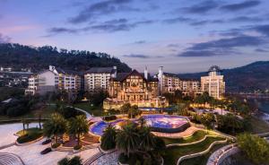 an aerial view of a hotel with a resort at Hilton Hangzhou Qiandao Lake Resort in Thousand Island Lake