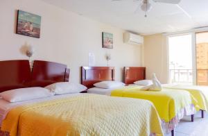 Voodi või voodid majutusasutuse Hostal Antares toas