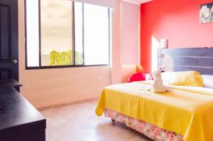 Voodi või voodid majutusasutuse Hostal Antares toas