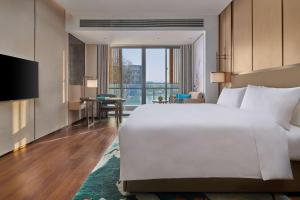 Voodi või voodid majutusasutuse Hilton Shanghai Fengxian toas