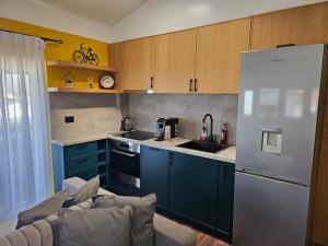 Η κουζίνα ή μικρή κουζίνα στο Drion Apartment with lake view