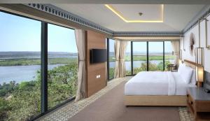 DoubleTree by Hilton Goa - Panaji客房内的一张或多张床位