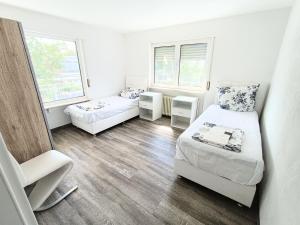 Ένα ή περισσότερα κρεβάτια σε δωμάτιο στο FMI13Furnished Accommodation