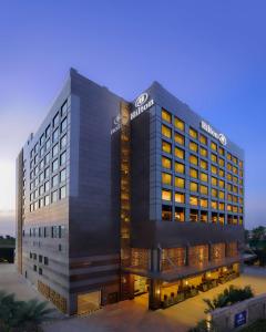 a rendering of the sutton condominium building at Hilton Chennai in Chennai