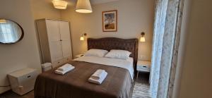 Postel nebo postele na pokoji v ubytování Portofino - With Free Parking + 27 fotografií