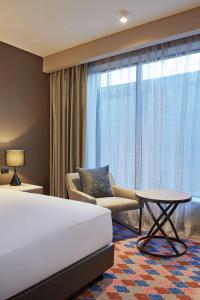 Doubletree By Hilton Perth Northbridge客房内的一张或多张床位