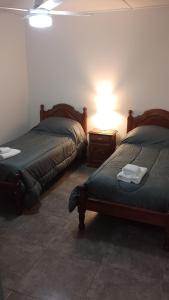Una cama o camas en una habitación de Casa vacacional COSTA CALMA