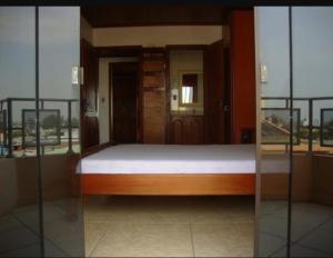 Postel nebo postele na pokoji v ubytování Cobertura no Centro do Balneário Arroio do Silva