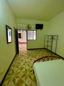เตียงในห้องที่ Hotel Los Balcones