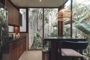Kuchyň nebo kuchyňský kout v ubytování Siwa Tulum Unique Hotel & Spa