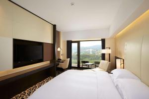 Postel nebo postele na pokoji v ubytování Hilton Gyeongju
