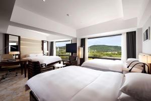 Postel nebo postele na pokoji v ubytování Hilton Gyeongju