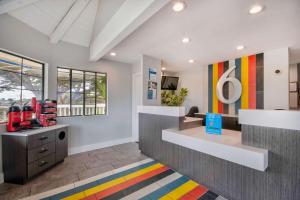 a lobby with a colorful rug in a store at Motel 6-Marina, CA - Monterey in Marina