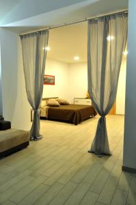 Ένα ή περισσότερα κρεβάτια σε δωμάτιο στο Ortaccio relais & private SPA