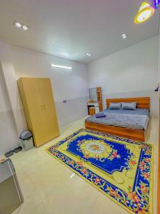Postel nebo postele na pokoji v ubytování NHÂN TÂY 2 HOTELs