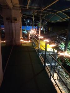 a train station at night with lights at Siren's House in Cusco