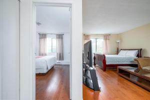 Postel nebo postele na pokoji v ubytování Croft Inn Motel