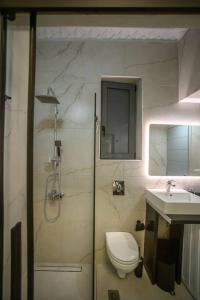 Koupelna v ubytování Etheras Luxury apartment